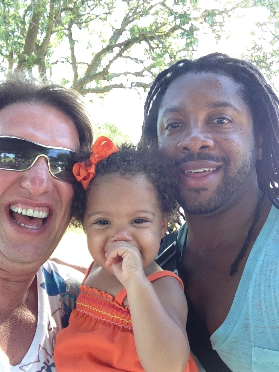 Marcus and John with their daughter – one of many families who opened their hearts to the camera.
